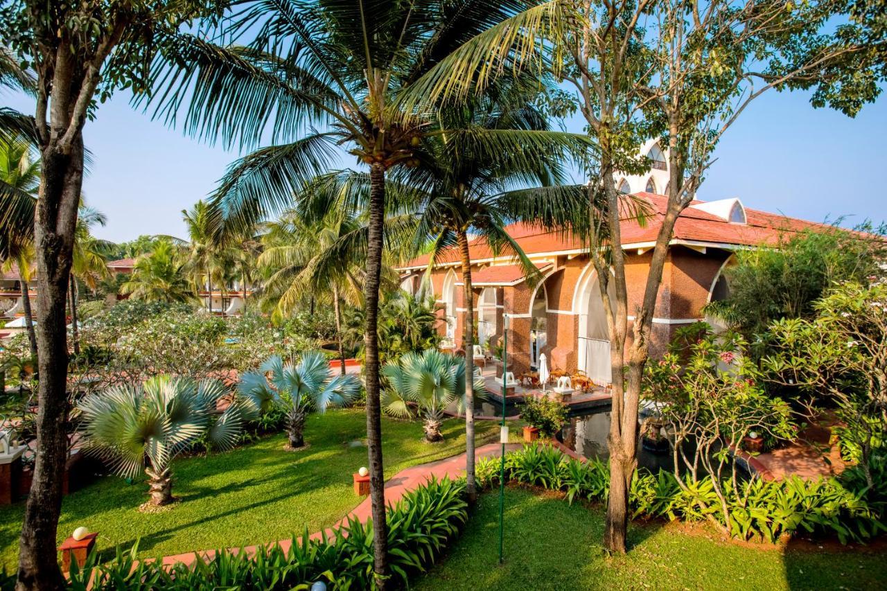 Caravela Beach Resort Varca Extérieur photo The resort's garden