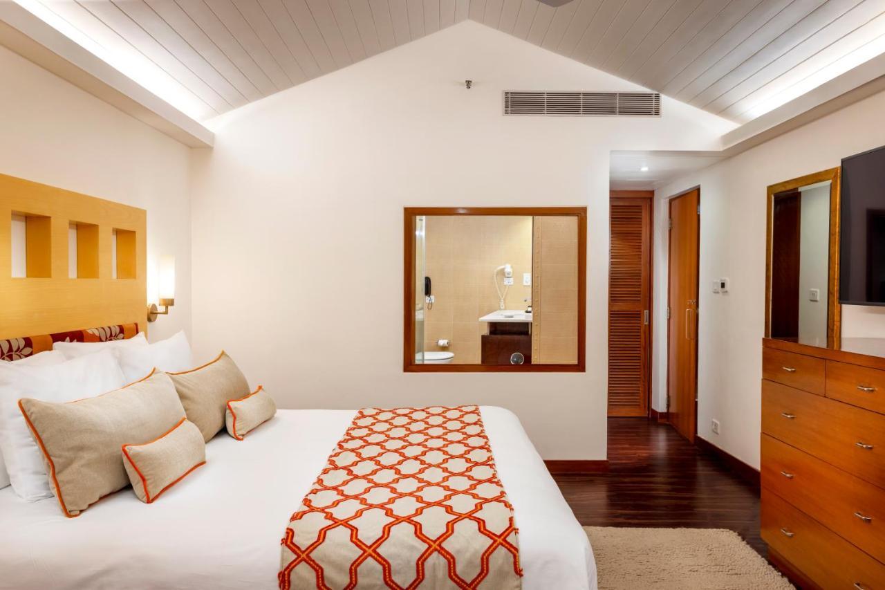 Caravela Beach Resort Varca Extérieur photo A bedroom at the Taj Bengal