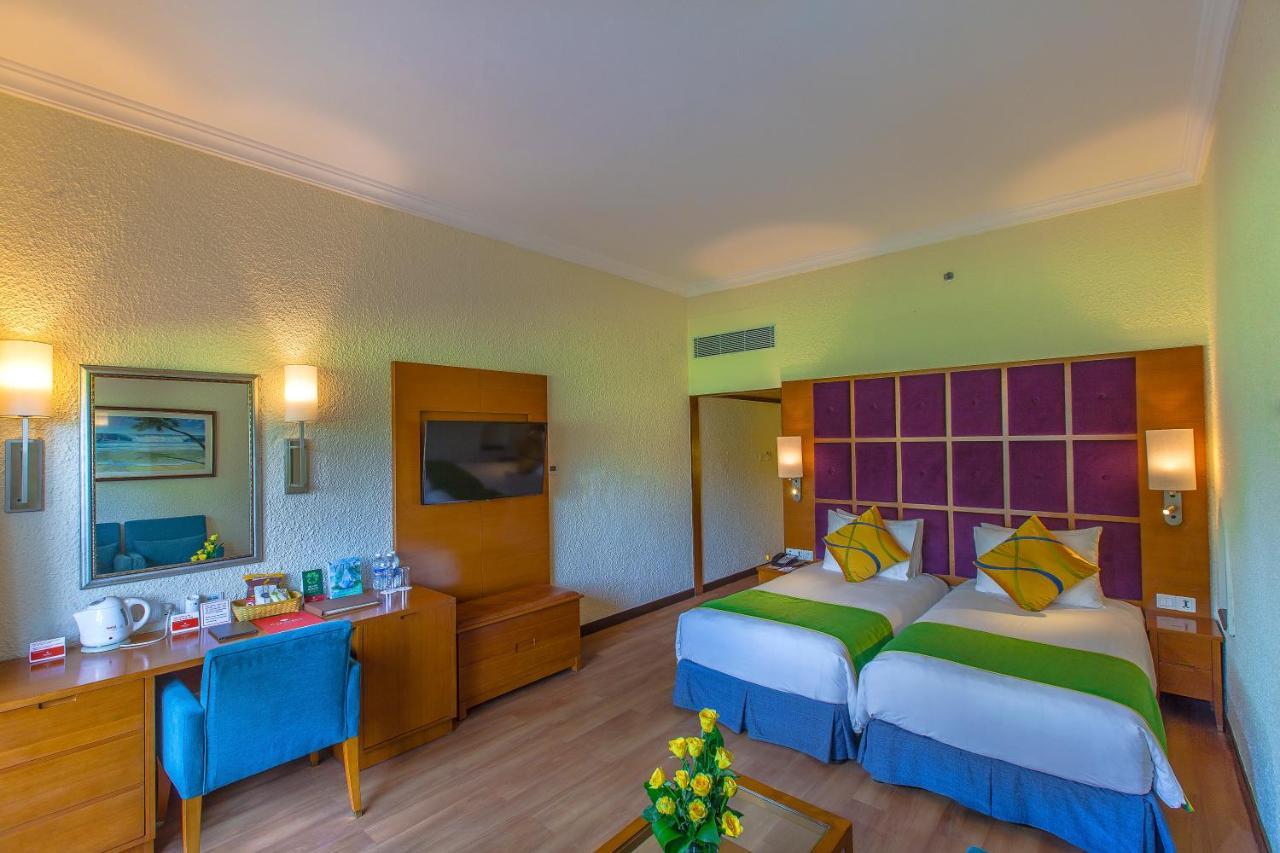 Caravela Beach Resort Varca Extérieur photo A room at the hotel